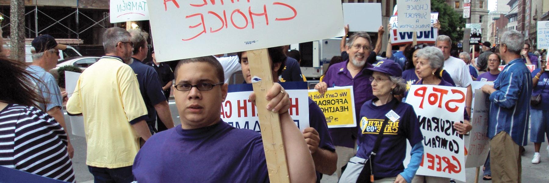 students marching in SEIU picket line